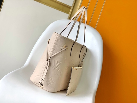 お気に入りはモノグラムのキャンバスのNeverfull MMのベージュ トート バックを決め付けた