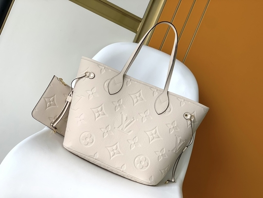 お気に入りはモノグラムのキャンバスのNeverfull MMのベージュ トート バックを決め付けた