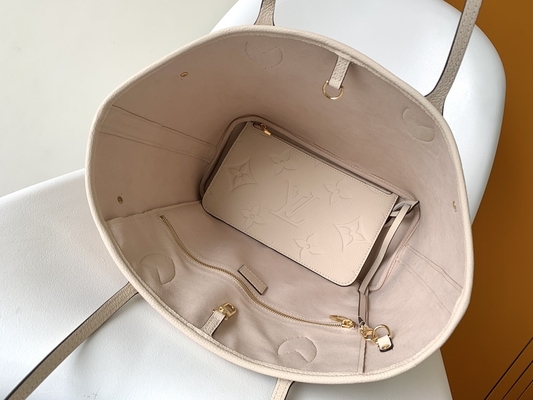 お気に入りはモノグラムのキャンバスのNeverfull MMのベージュ トート バックを決め付けた