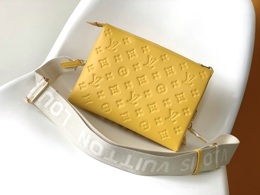 ヒマワリのモノグラムは注文の決め付けられた袋Coussin PMルイ・ヴィトンをふくらんでいるラムスキン浮彫りにした