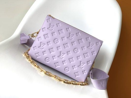 ヒマワリのモノグラムは注文の決め付けられた袋Coussin PMルイ・ヴィトンをふくらんでいるラムスキン浮彫りにした