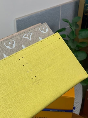 Pochette Felicie LV袋のばねのイン・ザ・シティの白いモノグラムEmpreinte