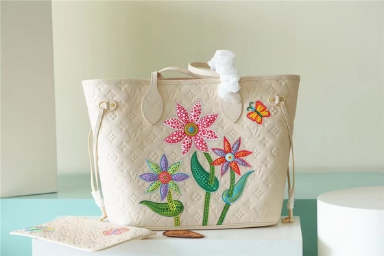党は女性を花の象眼が付いているハンドバッグのNeverfull MMのモノグラムEmpreinteと決め付けた