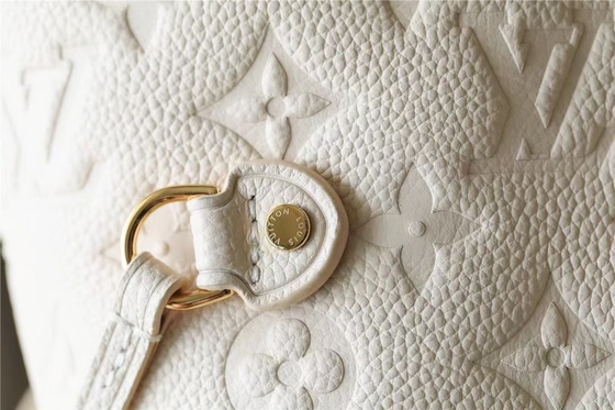 党は女性を花の象眼が付いているハンドバッグのNeverfull MMのモノグラムEmpreinteと決め付けた
