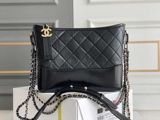 前に所有されたChanel Gabrielleのショルダー・バッグのルンペンのハンドバッグの子牛革