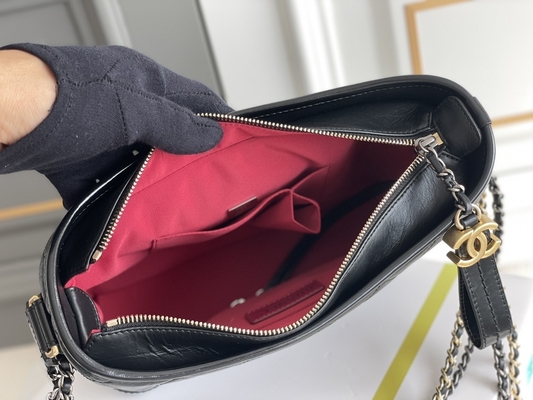 前に所有されたChanel Gabrielleのショルダー・バッグのルンペンのハンドバッグの子牛革
