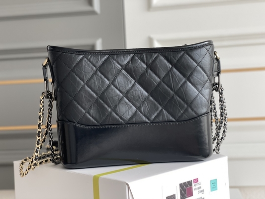 前に所有されたChanel Gabrielleのショルダー・バッグのルンペンのハンドバッグの子牛革