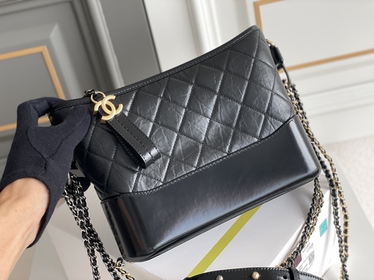 前に所有されたChanel Gabrielleのショルダー・バッグのルンペンのハンドバッグの子牛革