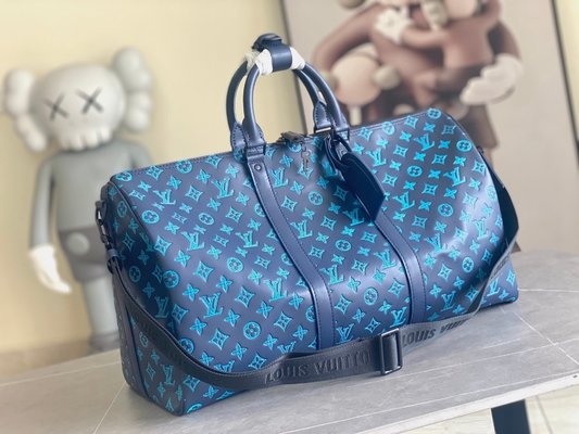 大きい決め付けられた人の袋のKeepall BANDOULIÈRE 50青いボストンの袋