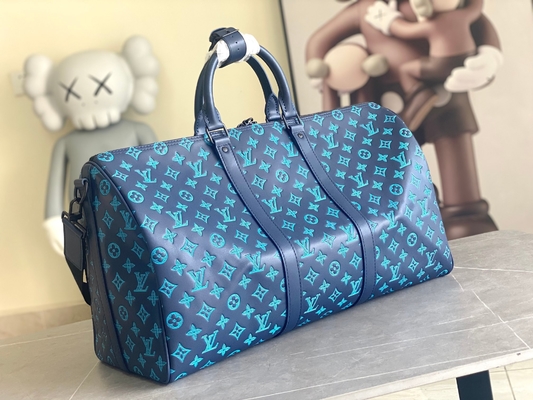 大きい決め付けられた人の袋のKeepall BANDOULIÈRE 50青いボストンの袋