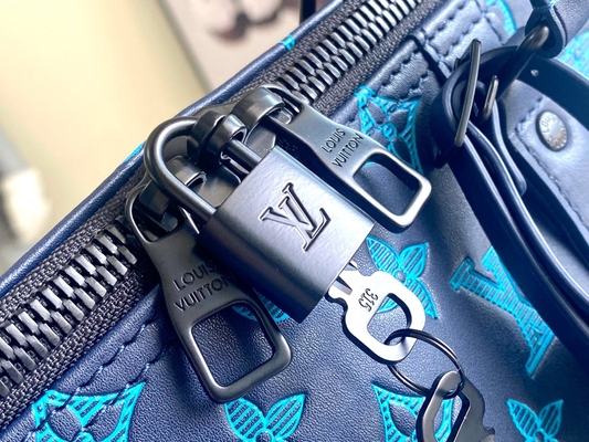 大きい決め付けられた人の袋のKeepall BANDOULIÈRE 50青いボストンの袋
