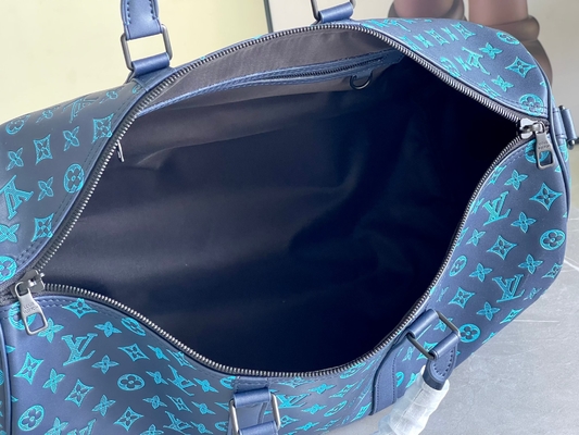 大きい決め付けられた人の袋のKeepall BANDOULIÈRE 50青いボストンの袋